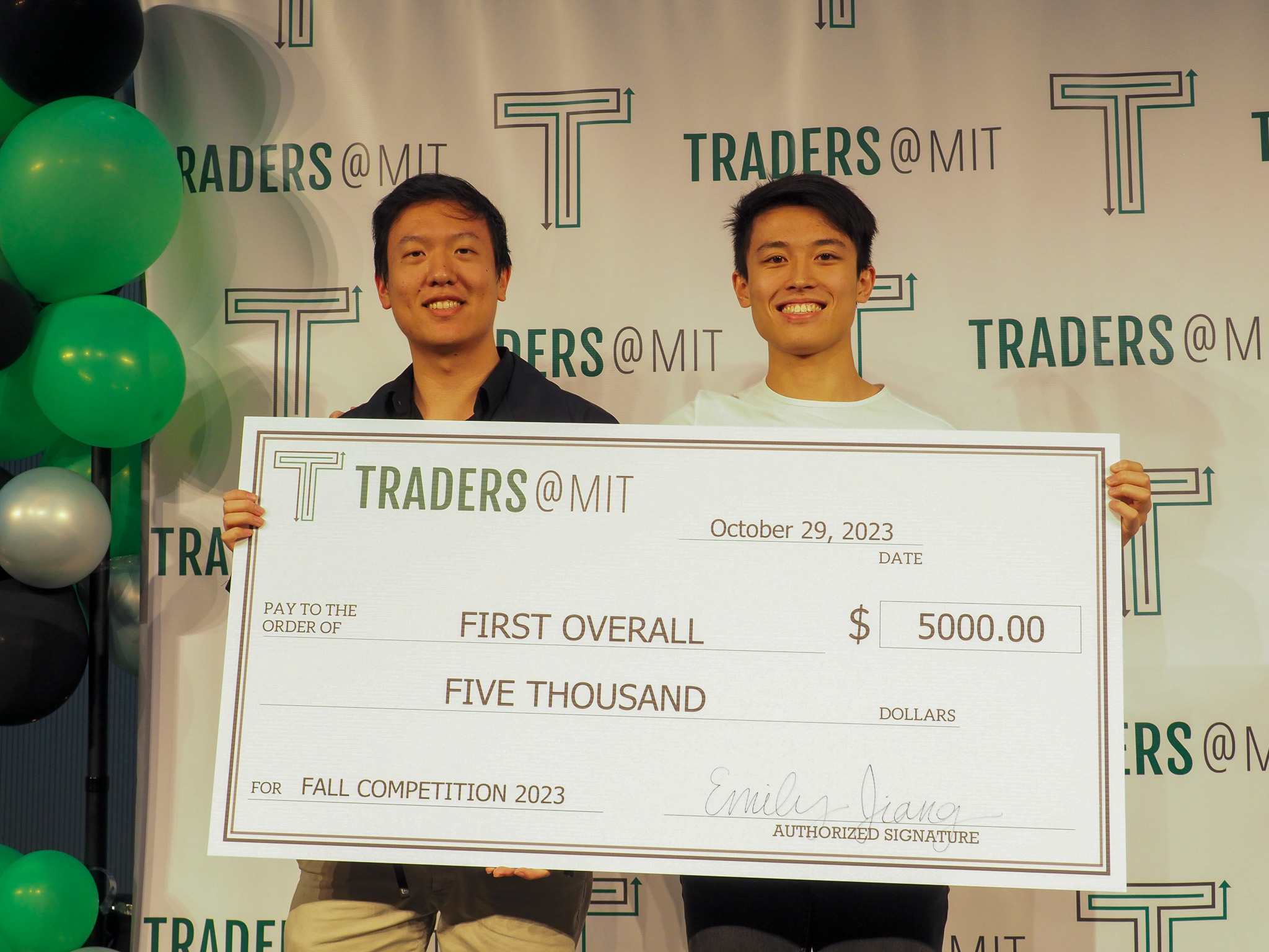 Trading competition winners with prize check